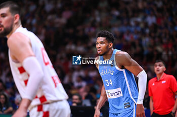 2024-07-07 - 34 Giannis Antetokounmpo of Greece is playing during the FIBA Olympic Qualifying Tournament 2024 Final match between Croatia and Greece at Peace & Friendship Stadium on July 7, 2024, in Piraeus, Greece. - CROATIA VS GREECE - FINAL, FIBA OLYMPIC QUALIFYING TOURNAMENTS - INTERNATIONALS - BASKETBALL