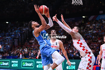 2024-07-07 - 34 Giannis Antetokounmpo of Greece competing with 40 Ivica Zubac of Croatia during the FIBA Olympic Qualifying Tournament 2024 Final match between Croatia and Greece at Peace & Friendship Stadium on July 7, 2024, in Piraeus, Greece. - CROATIA VS GREECE - FINAL, FIBA OLYMPIC QUALIFYING TOURNAMENTS - INTERNATIONALS - BASKETBALL