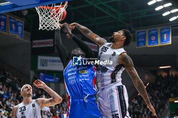 2024-02-05 - Duel under the basket between Gora Camara ( Nutribullet Treviso Basket ) and Jordan Mickey ( Virtus Segafredo Bologna ) - NUTRIBULLET TREVISO BASKET VS VIRTUS SEGAFREDO BOLOGNA - ITALIAN SERIE A - BASKETBALL