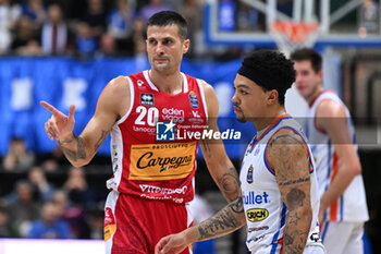 2024-03-30 - Andrea Cinciarini and Justin Robinson during BASKETBALL - ITALIAN SERIE A game between Nutribullet Treviso Basket and Carpegna Prosciutto Pesaro at Palaverde in Villorba, Italy on   March 30, 2024 - NUTRIBULLET TREVISO BASKET VS CARPEGNA PROSCIUTTO PESARO - ITALIAN SERIE A - BASKETBALL