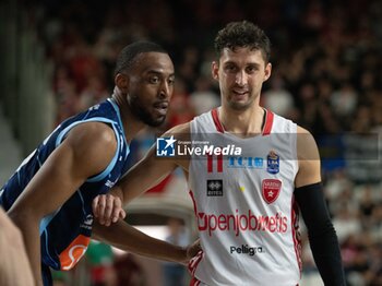 2024-04-07 - 11 Davide Moretti Openjobmetis Varese and 22 Markel BrownGenerazione Vincente Napoli during the LBA Italy Championship match between Openjobmetis Varese vs Generazione Vincente Napoli , in Varese, Italy, on April 7, 2024 - OPENJOBMETIS VARESE VS GEVI NAPOLI BASKET - ITALIAN SERIE A - BASKETBALL