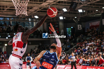 28/04/2024 - Mouhamed Faye (Unahotels Reggio Emilia) blocking a shot - UNAHOTELS REGGIO EMILIA VS GEVI NAPOLI BASKET - SERIE A ITALIA - BASKET