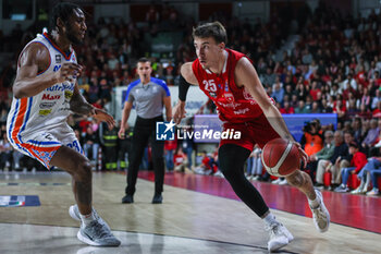 28/04/2024 - Hugo Besson #25 of Pallacanestro Varese OpenJobMetis (R) competes for the ball against Pauly Paulicap #33 of Nutribullet Treviso Basket (L) during LBA Lega Basket A 2023/24 Regular Season game between Pallacanestro Varese OpenJobMetis and Nutribullet Treviso Basket at Itelyum Arena, Varese, Italy on April 28, 2024 - OPENJOBMETIS VARESE VS NUTRIBULLET TREVISO BASKET - SERIE A ITALIA - BASKET