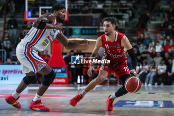 2024-04-28 - Davide Moretti #11 of Pallacanestro Varese OpenJobMetis (R) seen in action with Telly Allen #25 of Nutribullet Treviso Basket (L) during LBA Lega Basket A 2023/24 Regular Season game between Pallacanestro Varese OpenJobMetis and Nutribullet Treviso Basket at Itelyum Arena, Varese, Italy on April 28, 2024 - OPENJOBMETIS VARESE VS NUTRIBULLET TREVISO BASKET - ITALIAN SERIE A - BASKETBALL