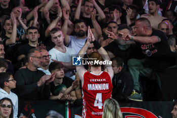 28/04/2024 - Niccolo Mannion #4 of Pallacanestro Varese OpenJobMetis celebrates with Pallacanestro Varese OpenJobMetis supporters at the end of the macth during LBA Lega Basket A 2023/24 Regular Season game between Pallacanestro Varese OpenJobMetis and Nutribullet Treviso Basket at Itelyum Arena, Varese, Italy on April 28, 2024 - OPENJOBMETIS VARESE VS NUTRIBULLET TREVISO BASKET - SERIE A ITALIA - BASKET