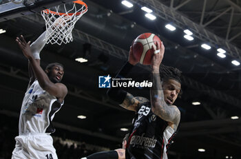 2024-05-11 - Ismael Kamagate (Tortona) in action thwarted by Daniel Hackett (Bologna) during the LBA during game 1 of the playoffs of the Italian Serie A1 basketball championship Segafredo Virtus Bologna Vs. Bertram Derthona Tortona at Segafredo Arena, Bologna, Italy, May 11, 2024 - Photo: Michele Nucci - PLAYOFF - VIRTUS SEGAFREDO BOLOGNA VS BERTRAM DERTHONA TORTONA - ITALIAN SERIE A - BASKETBALL