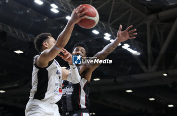 2024-05-11 - Colbey Ross (Tortona) in action thwarted by Jordan Mickey (Bologna) during the LBA during game 1 of the playoffs of the Italian Serie A1 basketball championship Segafredo Virtus Bologna Vs. Bertram Derthona Tortona at Segafredo Arena, Bologna, Italy, May 11, 2024 - Photo: Michele Nucci - PLAYOFF - VIRTUS SEGAFREDO BOLOGNA VS BERTRAM DERTHONA TORTONA - ITALIAN SERIE A - BASKETBALL