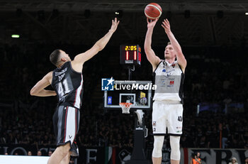 2024-05-11 - Leon Radosevic (Tortona) in action thwarted by Ante Zizic (Bologna) during the LBA during game 1 of the playoffs of the Italian Serie A1 basketball championship Segafredo Virtus Bologna Vs. Bertram Derthona Tortona at Segafredo Arena, Bologna, Italy, May 11, 2024 - Photo: Michele Nucci - PLAYOFF - VIRTUS SEGAFREDO BOLOGNA VS BERTRAM DERTHONA TORTONA - ITALIAN SERIE A - BASKETBALL