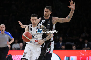 2024-05-11 - Tommaso Baldasso (Tortona) in action thwarted by Achille Polonara (Bologna) during the LBA during game 1 of the playoffs of the Italian Serie A1 basketball championship Segafredo Virtus Bologna Vs. Bertram Derthona Tortona at Segafredo Arena, Bologna, Italy, May 11, 2024 - Photo: Michele Nucci - PLAYOFF - VIRTUS SEGAFREDO BOLOGNA VS BERTRAM DERTHONA TORTONA - ITALIAN SERIE A - BASKETBALL