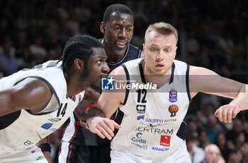 2024-05-11 - Bryant Dunston (Bologna) in action thwarted by Ismael Kamagate (Tortona) (L) and Arturs Strautins (Tortona) (R) during the LBA during game 1 of the playoffs of the Italian Serie A1 basketball championship Segafredo Virtus Bologna Vs. Bertram Derthona Tortona at Segafredo Arena, Bologna, Italy, May 11, 2024 - Photo: Michele Nucci - PLAYOFF - VIRTUS SEGAFREDO BOLOGNA VS BERTRAM DERTHONA TORTONA - ITALIAN SERIE A - BASKETBALL