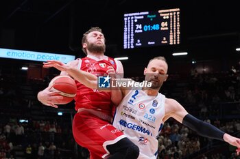 2024-05-27 - Nicolo Melli (EA7 Emporio Armani Olimpia Milano) thwarted by Miro Bilan (Germani Brescia) - EA7 EMPORIO ARMANI MILANO VS GERMANI BRESCIA - ITALIAN SERIE A - BASKETBALL