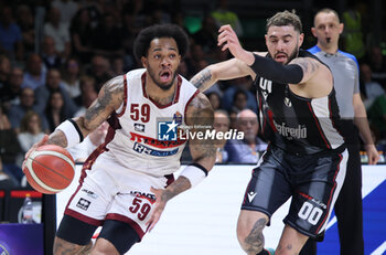 2024-05-26 - Rayjon Tucker (Umana Reyer Venezia) in action thwarted by Isaia Cordinier (Segafredo Virtus Bologna) during the LBA italian A1 series basketball championship match 2 of the playoffs semifinals Segafredo Virtus Bologna Vs. Umana Reyer Venezia at Segafredo Arena, Bologna, Italy, May 26, 2024 - Photo: Michele Nucci - VIRTUS BOLOGNA VS REYER VENEZIA - ITALIAN SERIE A - BASKETBALL