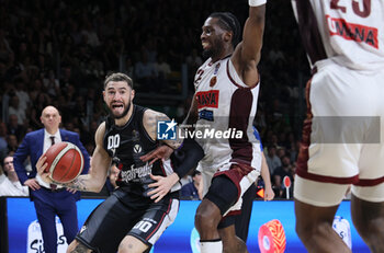 2024-05-26 - Isaia Cordinier (Segafredo Virtus Bologna) in action thwarted by Jordan Parks (Umana Reyer Venezia) during the LBA italian A1 series basketball championship match 2 of the playoffs semifinals Segafredo Virtus Bologna Vs. Umana Reyer Venezia at Segafredo Arena, Bologna, Italy, May 26, 2024 - Photo: Michele Nucci - VIRTUS BOLOGNA VS REYER VENEZIA - ITALIAN SERIE A - BASKETBALL