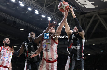 2024-06-06 - Stefano Tonut (Milano) in action thwarted by \Awudu Abass (Bologna) and Isaia Cordinier (Bologna) during race 1 of the playoffs final game of the LBA Italian basketball championship Segafredo Virtus Bologna vs EA7 Emporio Armani Olimpia Milano at Segafredo Arena, Bologna, Italy, June 06, 2024 - photo Michele Nucci - RACE 1 FINAL / VIRTUS SEGAFREDO BOLOGNA VS EA7 EMPORIO ARMANI MILANO - ITALIAN SERIE A - BASKETBALL