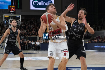 2024-10-05 - Juan Fernandez of Umana Reyer Venezia contrasted by Toto Forray of Dolomiti Energia Trentino during the match between Dolomiti Energia Trentino and Umana Reyer Venezia, regular season of LBA UnipolSai A1 Italian Basketball Championship 2024/2025 at il T Quotidiano Arena on October 5, 2024, Trento, Italy. - DOLOMITI ENERGIA TRENTINO VS UMANA REYER VENEZIA - ITALIAN SERIE A - BASKETBALL