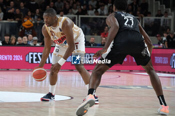 2024-10-05 - Mfiondu Kabengele of Umana Reyer Venezia carries the ball in action during the match between Dolomiti Energia Trentino and Umana Reyer Venezia, regular season of LBA UnipolSai A1 Italian Basketball Championship 2024/2025 at il T Quotidiano Arena on October 5, 2024, Trento, Italy. - DOLOMITI ENERGIA TRENTINO VS UMANA REYER VENEZIA - ITALIAN SERIE A - BASKETBALL