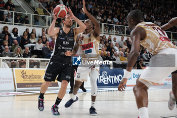 2024-10-05 - Penetration of Toto Forray of Dolomiti Energia Trentino during the match between Dolomiti Energia Trentino and Umana Reyer Venezia, regular season of LBA UnipolSai A1 Italian Basketball Championship 2024/2025 at il T Quotidiano Arena on October 5, 2024, Trento, Italy. - DOLOMITI ENERGIA TRENTINO VS UMANA REYER VENEZIA - ITALIAN SERIE A - BASKETBALL