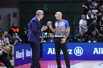 2024-10-12 - De Raffaele Walter (head coach Bertram Derthona Basket Tortona) and referee - BERTRAM DERTHONA TORTONA VS PALLACANESTRO TRIESTE - ITALIAN SERIE A - BASKETBALL