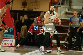 2024-11-10 - 021 Tornik’e Shengelia Virtus Bologna and 92 Jaron Johnson Openjobmetis Varese during the LBA Italy Championship match between Openjobmetis Varese vs Virtus Bologna, in Varese, Italy, on November 10, 2024 - OPENJOBMETIS VARESE VS VIRTUS SEGAFREDO BOLOGNA - ITALIAN SERIE A - BASKETBALL