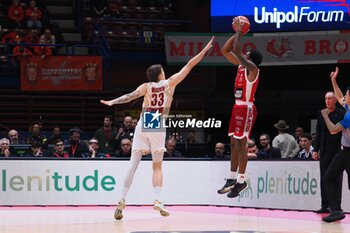 2024-11-10 - Armoni Brooks (EA7 Emporio Armani Olimpia Milano) 3 points shoot thwarted by Kyke Wiltjer (Umana Reyer Venezia) - EA7 EMPORIO ARMANI MILANO VS UMANA REYER VENEZIA - ITALIAN SERIE A - BASKETBALL