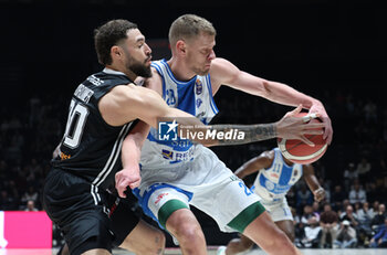 2024-11-17 - Eimantas Bendzius (Sassari) (R) in action thwarted by Isaia Cordinier (Virtus Bologna) during the LBA italian A1 series basketball championship match between Segafredo Virtus Bologna and Banco di Sardegna Dinamo Sassari at Unipol Arena, Casalecchio (Bologna), Italy, November 17, 2024 - Photo: Michele Nucci - VIRTUS SEGAFREDO BOLOGNA VS BANCO DI SARDEGNA SASSARI - ITALIAN SERIE A - BASKETBALL