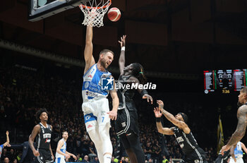 2024-11-17 - Miralem Halilovic (Sassari) in action thwarted by Momo Diouf (Virtus Bologna) during the LBA italian A1 series basketball championship match between Segafredo Virtus Bologna and Banco di Sardegna Dinamo Sassari at Unipol Arena, Casalecchio (Bologna), Italy, November 17, 2024 - Photo: Michele Nucci - VIRTUS SEGAFREDO BOLOGNA VS BANCO DI SARDEGNA SASSARI - ITALIAN SERIE A - BASKETBALL