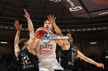 2024-01-06 - Matteo Fantinelli (Fortitudo Flats Services Bologna) thwarted by Raphael Gaspardo (Apu Udine) during the italian basketball LBN A2 series championship match Fortitudo Flats Services Bologna Vs Apu Old Wild West Udine - Bologna, Italy, January 06, 2024 at Paladozza sports hall - Photo: Michele Nucci - FORTITUDO BOLOGNA VS UDINE - ITALIAN SERIE A2 - BASKETBALL