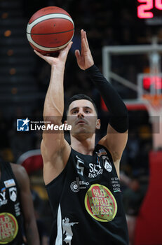 2024-01-06 - Mirza Alibegovic (Apu Udine) throws a free throw during the italian basketball LBN A2 series championship match Fortitudo Flats Services Bologna Vs Apu Old Wild West Udine - Bologna, Italy, January 06, 2024 at Paladozza sports hall - Photo: Michele Nucci - FORTITUDO BOLOGNA VS UDINE - ITALIAN SERIE A2 - BASKETBALL