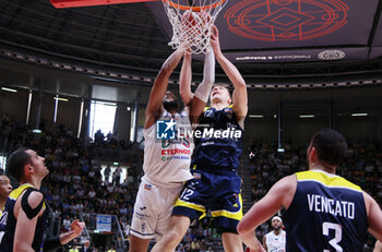 14/04/2024 - Mark Ogden (Fortitudo) in action thwarted by Federico Poser (Torino) during the italian basketball LBN A2 series championship match Fortitudo Flats Services Bologna Vs Reale Mutua Torino - Bologna, Italy, April 14, 2024 at Paladozza sports hall - Photo: Michele Nucci - FORTITUDO BOLOGNA VS TORINO - SERIE A2 - BASKET