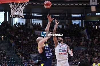 14/04/2024 - Mark Ogden (Fortitudo) in action thwarted by Marco Cusin (Torino) during the italian basketball LBN A2 series championship match Fortitudo Flats Services Bologna Vs Reale Mutua Torino - Bologna, Italy, April 14, 2024 at Paladozza sports hall - Photo: Michele Nucci - FORTITUDO BOLOGNA VS TORINO - SERIE A2 - BASKET
