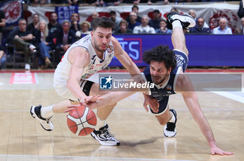 07/05/2024 - Luca Vitali (Treviglio) in action thwarted by Matteo Fantinelli (Fortitudo) during the italian basketball LBN A2 series championship game 2 of the playoff quarterfinals Fortitudo Flats Services Bologna Vs Blu Basket Gruppo Mascio Treviglio - Bologna, Italy, May 07, 2024 at Paladozza sports hall - Photo: Michele Nucci - FLATS SERVICE FORTITUDO BOLOGNA VS GRUPPO MASCIO TREVIGLIO - SERIE A2 - BASKET