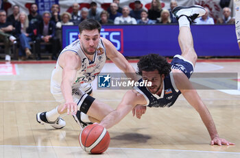 2024-05-07 - Luca Vitali (Treviglio) in action thwarted by Matteo Fantinelli (Fortitudo) during the italian basketball LBN A2 series championship game 2 of the playoff quarterfinals Fortitudo Flats Services Bologna Vs Blu Basket Gruppo Mascio Treviglio - Bologna, Italy, May 07, 2024 at Paladozza sports hall - Photo: Michele Nucci - FLATS SERVICE FORTITUDO BOLOGNA VS GRUPPO MASCIO TREVIGLIO - ITALIAN SERIE A2 - BASKETBALL