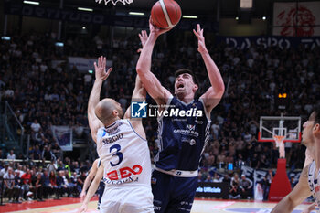 2024-05-07 - A.J. Pacher (Treviglio) in action thwarted by Luigi Sergio (Fortitudo) during the italian basketball LBN A2 series championship game 2 of the playoff quarterfinals Fortitudo Flats Services Bologna Vs Blu Basket Gruppo Mascio Treviglio - Bologna, Italy, May 07, 2024 at Paladozza sports hall - Photo: Michele Nucci - FLATS SERVICE FORTITUDO BOLOGNA VS GRUPPO MASCIO TREVIGLIO - ITALIAN SERIE A2 - BASKETBALL