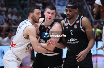 2024-06-09 - Riccardo Bolpin (Fortitudo) and Amar Alibegovic (Trapani) and Chris Horton (Trapani) during the italian basketball “Old Wild West” Lnp championship game 4 of the playoff finals between Fortitudo Flats Services Bologna and Trapani Shark - Bologna, Italy, June 09, 2024 at Paladozza sports hall - Photo: Michele Nucci - GAME 4 - FORTITUDO BOLOGNA VS TRAPANI - ITALIAN SERIE A2 - BASKETBALL