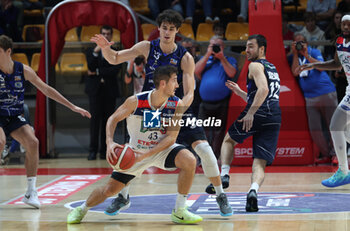 2024-10-09 - Gherardo Sabatini (Fortitudo) in action thwarted by Samuele Moretti (Orzinuovi) during the italian basketball LBN A2 series championship match Fortitudo Flats Services Bologna Vs Agribertocchi Orzinuovi - Bologna, Italy, October 09, 2024 at Paladozza sports hall - Photo: Michele Nucci - FORTITUDO BOLOGNA VS ORZINUOVI  - ITALIAN SERIE A2 - BASKETBALL