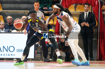 2024-11-10 - Fadilou seck (Torino) in action thwarted by Deshawn Freeman (Fortitudo) during the italian basketball LBN A2 series championship match Fortitudo Flats Services Bologna Vs Reale Mutua Torino at Paladozza sports hall. Bologna, Italy, November 10, 2024 - Photo: Michele Nucci - FORTITUDO BOLOGNA VS BASKET TORINO - ITALIAN SERIE A2 - BASKETBALL