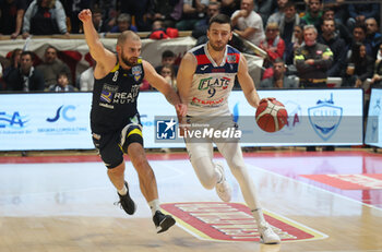 2024-11-10 - Riccardo Bolpin (Fortitudo) in action thwarted by Matteo Schina (Torino) during the italian basketball LBN A2 series championship match Fortitudo Flats Services Bologna Vs Reale Mutua Torino at Paladozza sports hall. Bologna, Italy, November 10, 2024 - Photo: Michele Nucci - FORTITUDO BOLOGNA VS BASKET TORINO - ITALIAN SERIE A2 - BASKETBALL