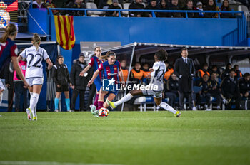 2024-01-17 - Mariona Caldentey (L) of Barcelona seen in action against Naomie Feller (R) of Real Madrid during the women football match valid for the semi final of the Spanish Supercopa tournament between Barcelona and Real Madrid played at Estadio Butarque in Leganes, Spain. - BARCELONA VS REAL MADRID - OTHER - SOCCER