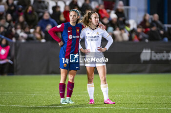 2024-01-17 - Aitana Bonmati (L) of Barcelona seen hugging Maite Oroz (R) of Real Madrid during the women football match valid for the semi final of the Spanish Supercopa tournament between Barcelona and Real Madrid played at Estadio Butarque in Leganes, Spain. - BARCELONA VS REAL MADRID - OTHER - SOCCER