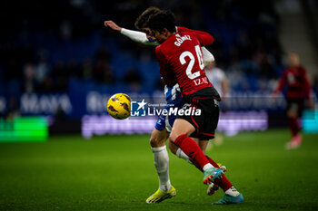 2024-02-17 - Gomez (CD Mirandes) and Puado (RCD Espanyol) during a La Liga Hypermotion match between RCD Espanyol and CD Mirandes at Stage Front Stadium, in Barcelona, ,Spain on February 17, 2024. Photo by Felipe Mondino - RCD ESPANYOL - CD MIRANDES - OTHER - SOCCER