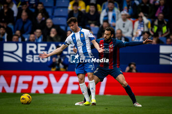 2024-03-02 - Ivan Martos (SD Huesca) and Puado (RCD Espanyol) during a La Liga Hypermotion match between RCD Espanyol and SD Huesca at Stage Front Stadium, in Barcelona, ,Spain on March 2, 2024. Photo by Felipe Mondino - RCD ESPANYOL - SD HUESCA - OTHER - SOCCER
