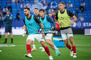 2024-06-13 - Gaspar (Sporting de Gijon) and Queipo (Sporting de Gijon) warm up during a Playoff La Liga Hypermotion match between RCD Espanyol and Real Sporting at Stage Front Stadium, in Barcelona, ,Spain on June 13, 2024. Photo by Felipe Mondino - RCD ESPANYOL - REAL SPORTING - OTHER - SOCCER