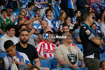 2024-06-13 - Supporters of Real Sporting are seen during a Playoff La Liga Hypermotion match between RCD Espanyol and Real Sporting at Stage Front Stadium, in Barcelona, ,Spain on June 13, 2024. Photo by Felipe Mondino - RCD ESPANYOL - REAL SPORTING - OTHER - SOCCER