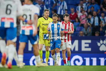 2024-06-13 - Goalkeeper Yanez (Sporting de Gijon) and Braithwaite (RCD Espanyol) gestures during a Playoff La Liga Hypermotion match between RCD Espanyol and Real Sporting at Stage Front Stadium, in Barcelona, ,Spain on June 13, 2024. Photo by Felipe Mondino - RCD ESPANYOL - REAL SPORTING - OTHER - SOCCER