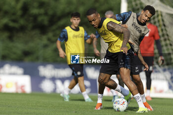 2024-07-11 - Napoli's Brazilian defender Natan challenges for the ball with Napoli's Belgian forward Cyril Ngonge during SSC Napoli's 2024-25 preseason training camp in val di sole in Trentino, Dimaro Folgarida

 - SSC NAPOLI TRAINING - OTHER - SOCCER