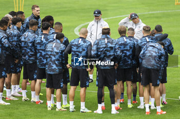 2024-07-12 - Napoli’s Italian coach Antonio Conte with group during SSC Napoli's 2024-25 preseason training camp in val di sole in Trentino, Dimaro Folgarida

 - SSC NAPOLI TRAINING - OTHER - SOCCER