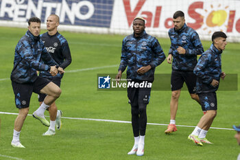 2024-07-12 - Napoli's Kosovar defender Amir Rrahmani (L), Napoli's Norwegian defender Leo Ostigard, Napoli's Nigerian forward Victor Osimhen, Napoli's Italian midfielder Gianluca Gaetano during SSC Napoli's 2024-25 preseason training camp in val di sole in Trentino, Dimaro Folgarida

 - SSC NAPOLI TRAINING - OTHER - SOCCER