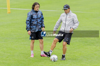 2024-07-12 - Napoli’s Italian coach Antonio Conte and Napoli's Portuguese defender Mario Rui during SSC Napoli's 2024-25 preseason training camp in val di sole in Trentino, Dimaro Folgarida

 - SSC NAPOLI TRAINING - OTHER - SOCCER