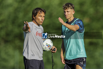 2024-07-14 - Napoli’s Italian coach Antonio Conte and Napoli's Danish midfielder Jesper Lindstrom during SSC Napoli's 2024-25 preseason training camp in val di sole in Trentino, Dimaro Folgarida

 - SSC NAPOLI TRAINING - OTHER - SOCCER