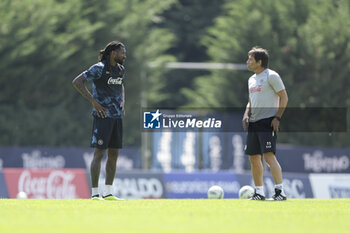 2024-07-15 - Napoli's Cameroonian midfielder Andre Frank Zambo Anguissa and Napoli’s Italian coach Antonio Conte during SSC Napoli's 2024-25 preseason training camp in val di sole in Trentino, Dimaro Folgarida

 - SSC NAPOLI TRAINING - OTHER - SOCCER